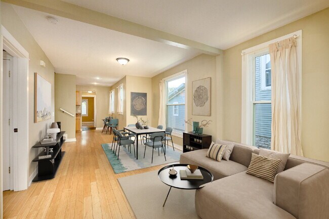 Foto del edificio - Charming 4-Bedroom Home with Gleaming Hardwood Floors in Vibrant Minneapolis Neighborhood!
