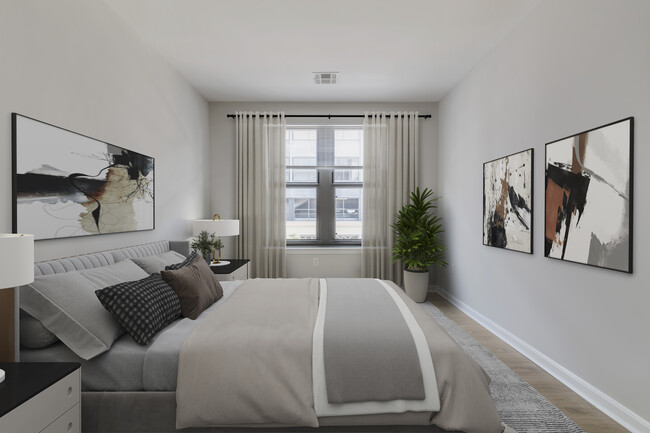 Renovated Package II bedroom with hard surface flooring - Avalon at Assembly Row