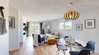 Located in Golden, Colorado, this one-bedroom, one-bathroom residence offers a thoughtfully designed single-floor layout with a bright, open feel. The living and dining area is the heart of the home, featuring light hardwood-style flooring, a white-painted brick accent wall, and large windows that invite natural light and frame views of the surrounding Colorado landscape. A sliding glass door opens to a private balcony, extending the living space outdoors. A stylish pendant light anchors the dining nook, while built-in wall shelving adds functional character to the living area.

The galley-style kitchen is efficiently designed with rich dark cabinetry, white countertops, stainless steel appliances, a double-basin sink, and a herringbone tile backsplash — providing ample storage and prep space.

The bedroom is a comfortable retreat with plush carpeting, a ceiling fan, and a warm two-tone accent wall with floating display shelves. A wall-mounted hook rail and dedicated workspace add practical versatility to the room.

The bathroom features a vessel sink set atop a marble-look vanity, brushed nickel fixtures, a full tub and shower combination, and wood-look flooring, creating a clean and modern aesthetic throughout.