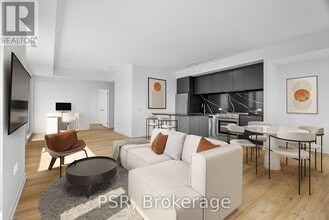 Building Photo - 101-3101 Roehampton Ave