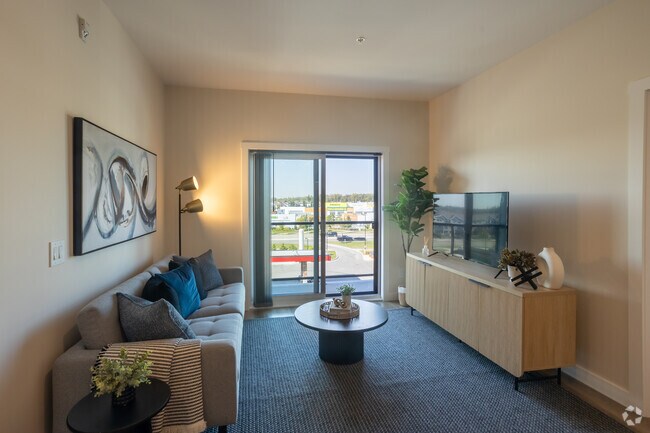 2 chambres, 2 salles de bain, + bureau - 931 pi2 - Salon - Vista Apartments at Edgemont