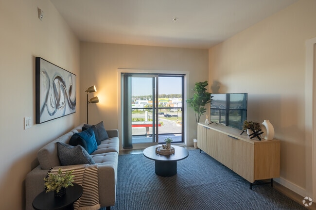 2BR, 2BA, +Den - 931SF - Living Room - Vista Apartments at Edgemont