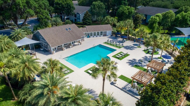 Lounge in style, take a refreshing dip, and let the worries of the day melt away as you enjoy the tranquil ambiance of our expansive pool deck. - Emerson Isles