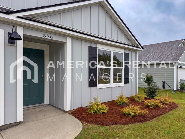 Building Photo - New Construction 4 Bedroom / 2 Bath Home -...
