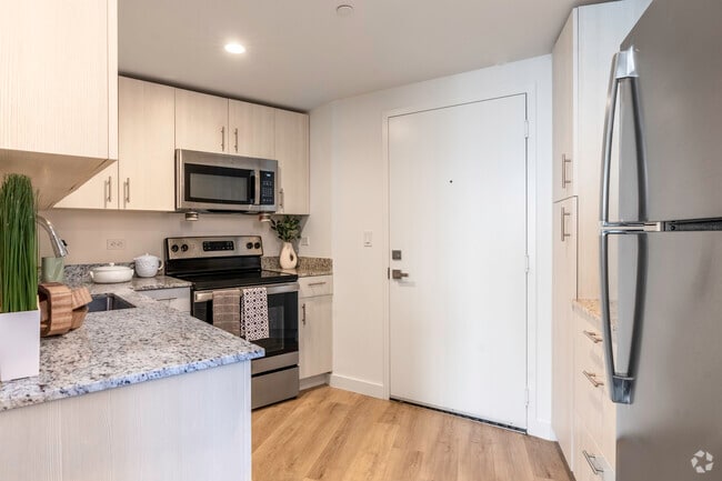 1BR, 1BA - 525SF - Kitchen - Three Round Tower B&C
