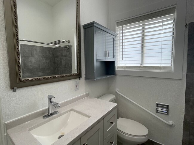 Building Photo - Updated 2 bedroom, large fenced back yard ...
