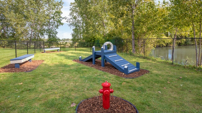 Let your furry friends run and play in our spacious dog park with plenty of green space, professionally operated by Highlands Vista Group. - Atlas North