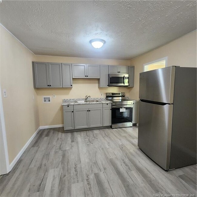 Building Photo - 1201 Thelbert Dr