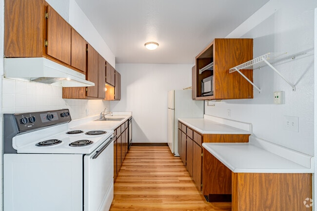 2 habitaciones, 1 baño - 975 pies cuadrados - Cocina - Quail Creek Apartments