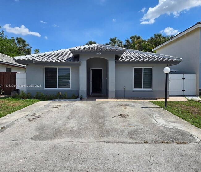 Building Photo - 18402 NW 56th Pl