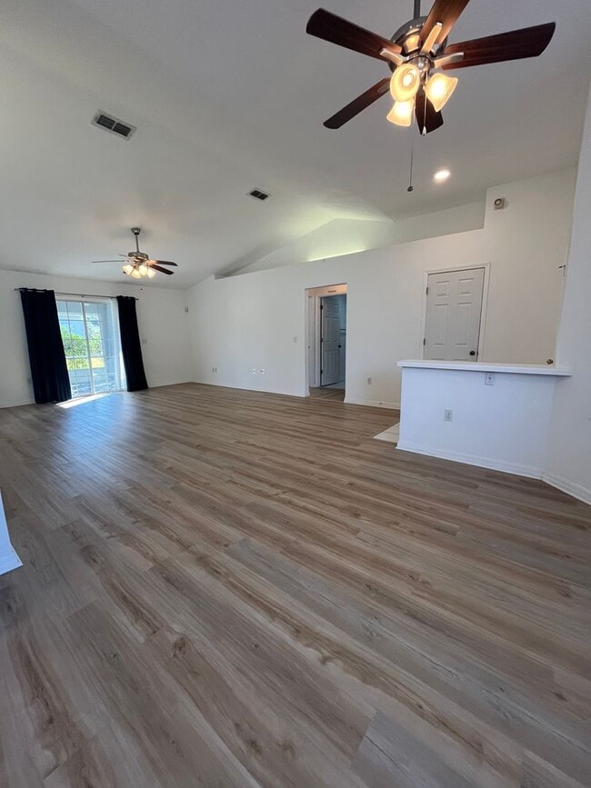 Building Photo - NEW VINYL PLANK FLOORING!! Pine Lakes Subdivision Corner Lot!
