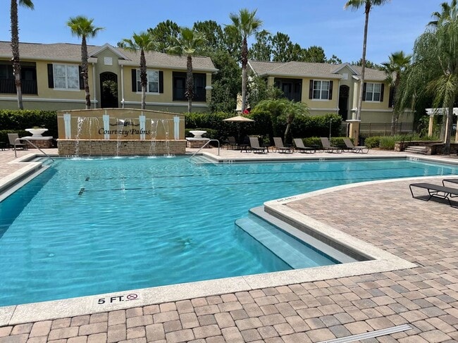Building Photo - 9918 Courtney Palms Blvd