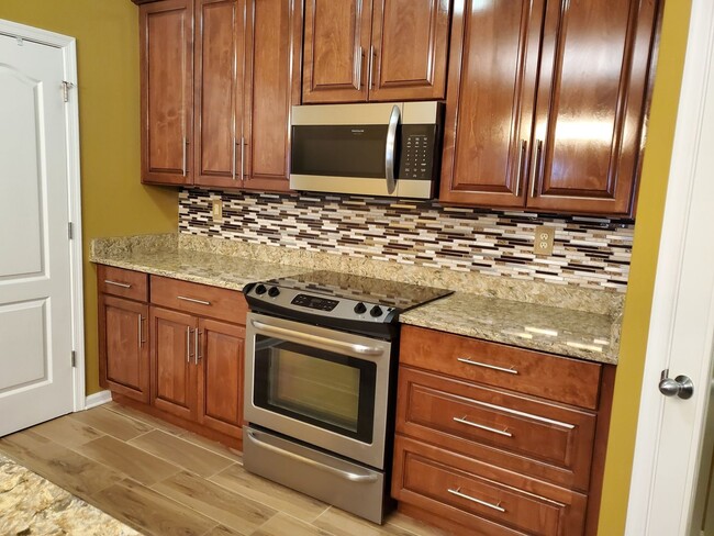 Building Photo - Stunning First-Floor Condo
