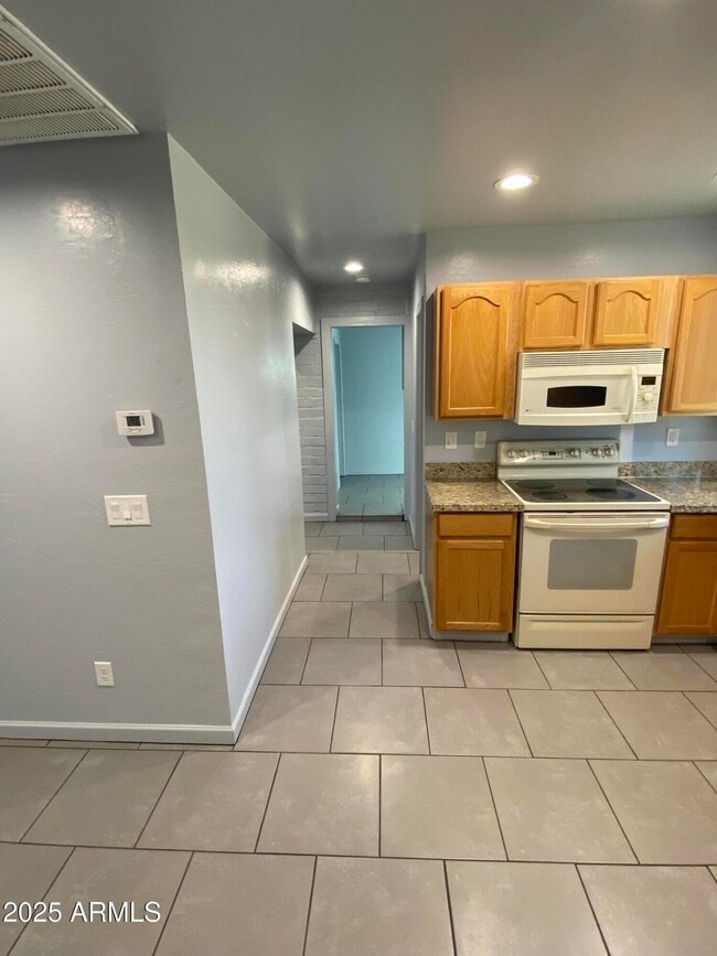 Building Photo - 215 N Pima Rd