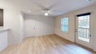 This contemporary 1080 square foot home in Columbia, SC offers a harmonious blend of style and functionality. The single-story layout encompasses three bedrooms, including a spacious 170 square foot primary bedroom, and two well-appointed bathrooms. The heart of the home is an open-concept kitchen and living area, showcasing dark wood cabinetry, stainless steel appliances, and elegant pendant lighting. Granite countertops and a convenient breakfast bar add both beauty and practicality to the space. Throughout the home, light-toned wood flooring creates a sense of warmth and continuity. Large windows in the bedrooms and living areas flood the space with natural light, while ceiling fans ensure comfort year-round. The bathrooms feature modern fixtures, including granite vanity tops and ample storage. With its clean lines, neutral color palette, and thoughtful design, this home presents an ideal canvas for a variety of decorating styles, perfect for those seeking a contemporary living space in a desirable location.