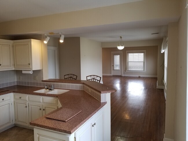 View from Kitchen into Living Room - 301 Bellefontaine Ave