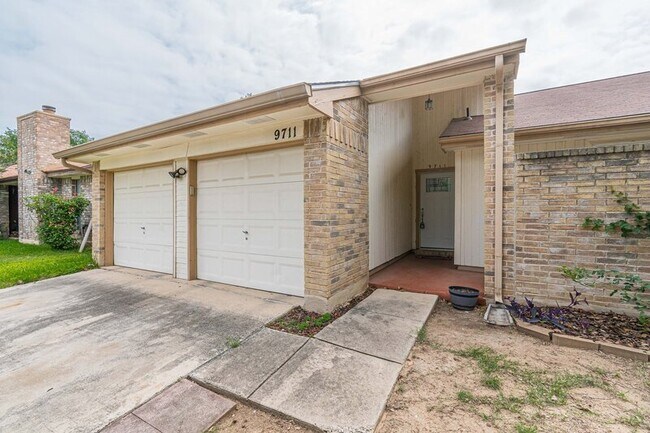 Building Photo - 9711 Woodland Hills