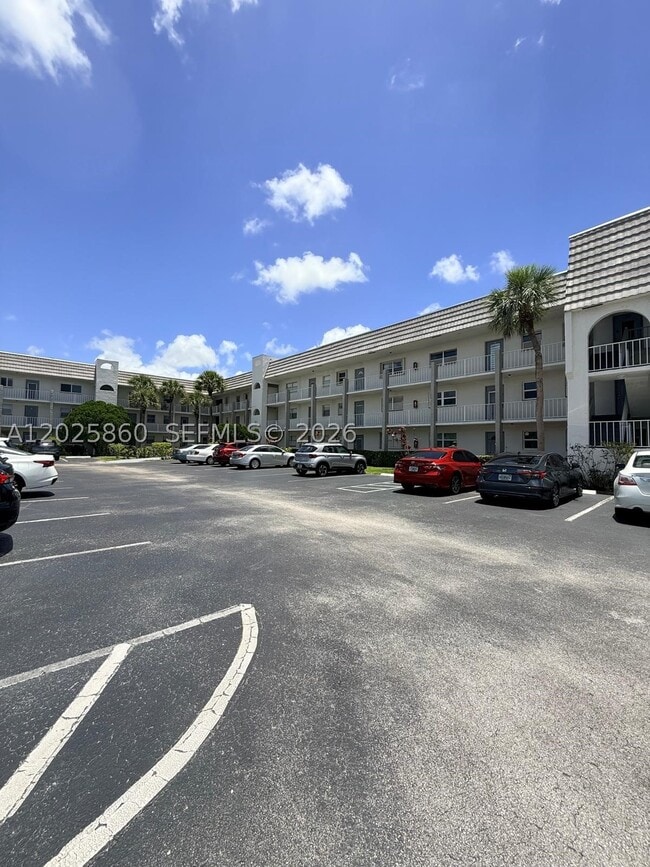Building Photo - 8595 Sunrise Lakes Blvd