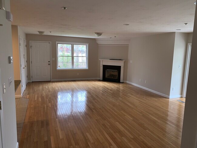 Living Room with Corner Fireplace - 117 Regency Ln