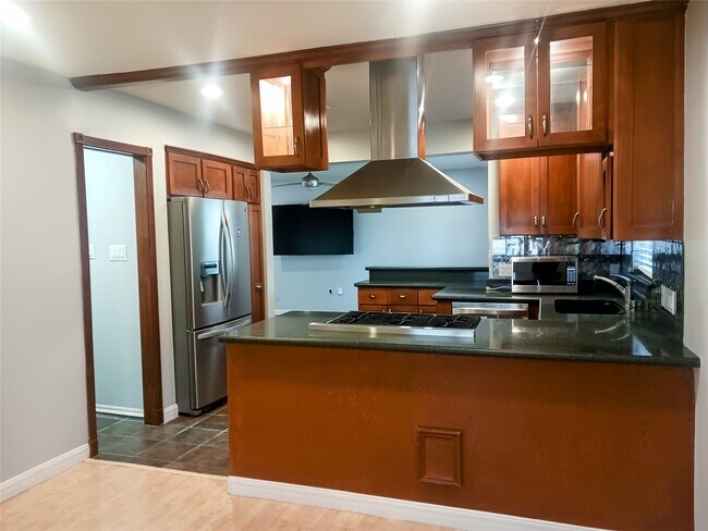 Foto del edificio - 923 W 41st St