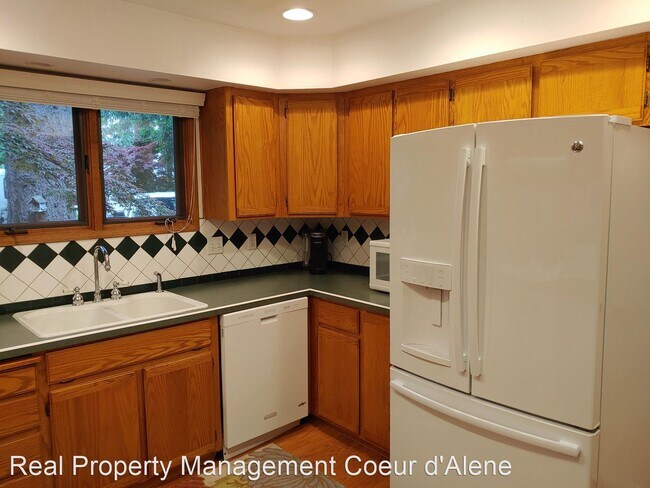 Foto del edificio - 4 br, 2.5 bath House - 10290 Fairway Dr.