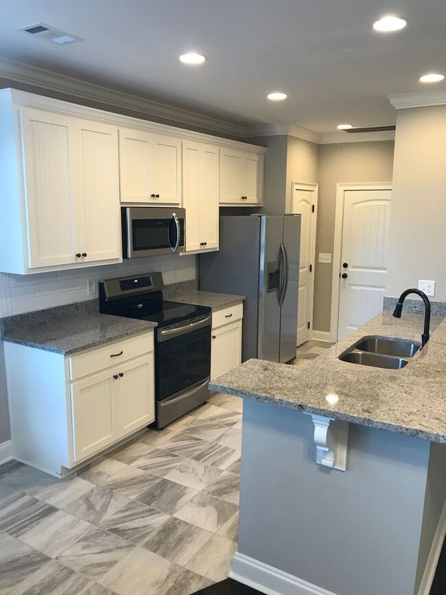 Building Photo - The Townhomes of Runningvine