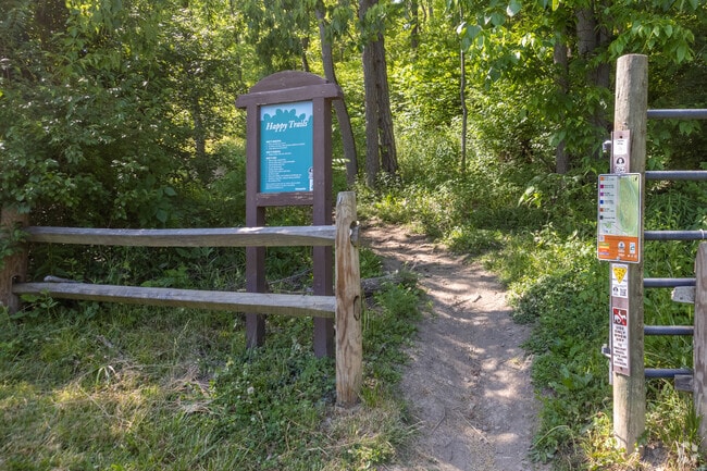 A mountain bike trail in Mt. Airy Forest near Westwood is titled Happy Trails.
