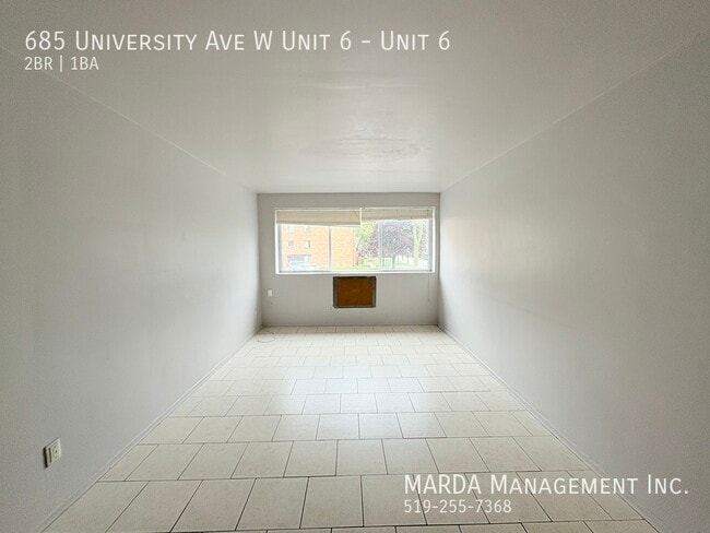 Building Photo - BRIGHT & SPACIOUS 2 BED/1 BATH APARTMENT -...