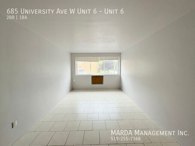 Photo du bâtiment - BRIGHT & SPACIOUS 2 BED/1 BATH APARTMENT -...