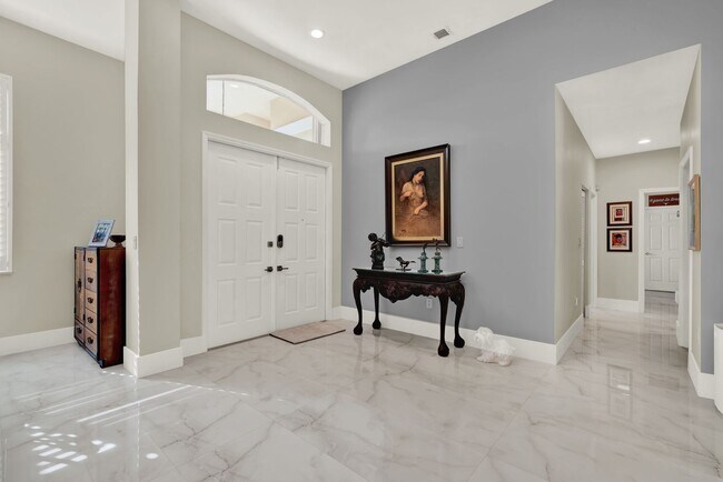 Building Photo - Elegant 4-Bedroom Pool Home in Exclusive G...