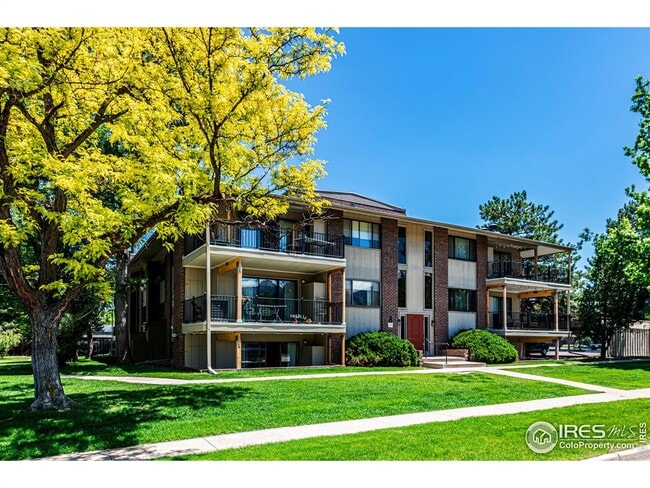 Exterior with new balconies - 600 Manhattan Dr