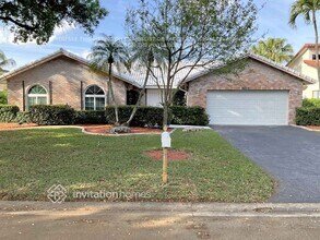 Building Photo - 8825 NW 57th Ct