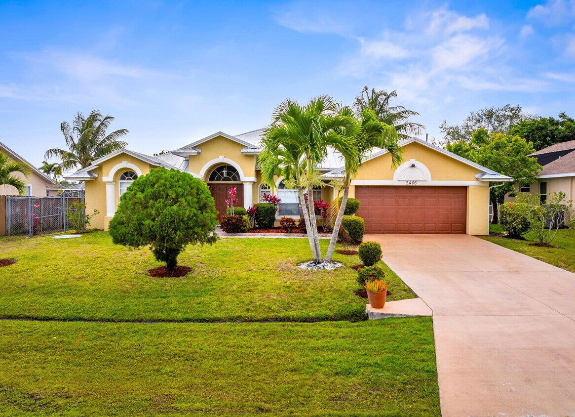 Photo - 2466 Southwest Lafayette Street, Port St. Lucie, FL 34984 - 3 BR 2 BA Single-Family Home