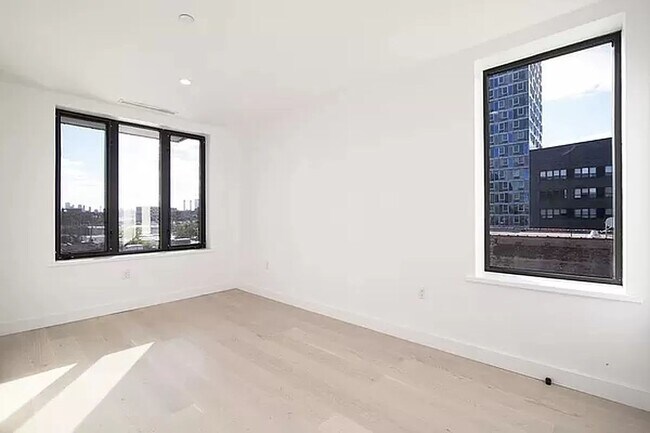 Building Photo - 2-22 51st Avenue