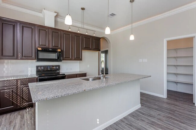 Building Photo - The Oaks at Suncreek Estates