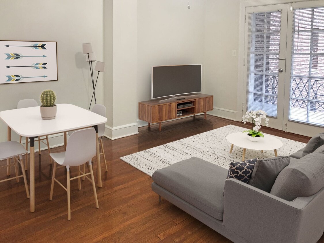 One-bedroom apartment living area (virtually staged) - Highview and Castle Manor
