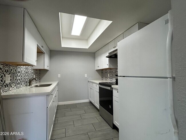 Foto del edificio - 9618 N 5th St