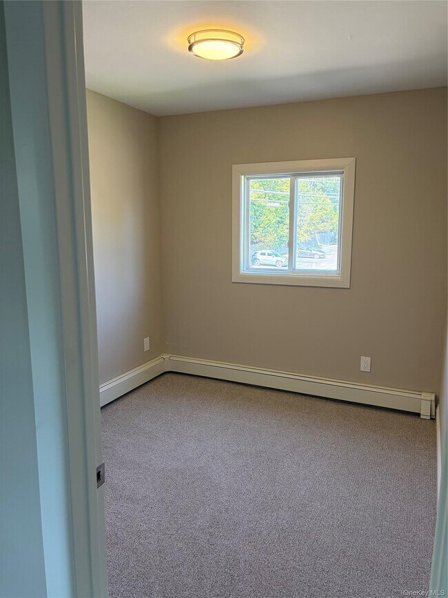 Building Photo - 48 Penataquit Ave
