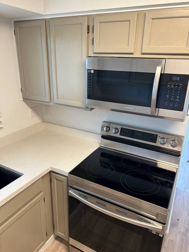 New Stove and Microwave - 8439 E Montebello Ave