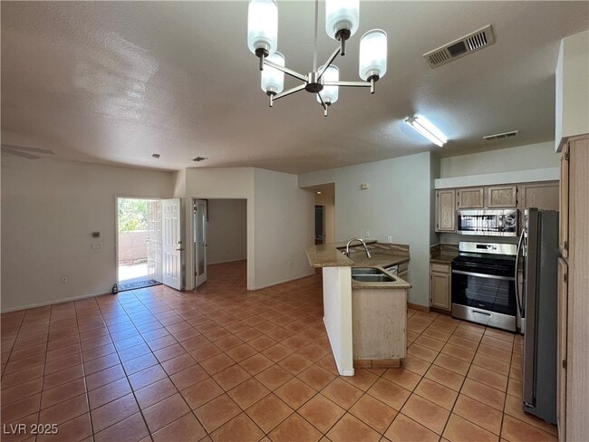 Foto del edificio - 5415 W Harmon Ave