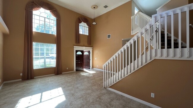 Building Photo - Spacious 4/3.5 Pool Home with Water View & 3-Car Garage in Lee Vista Area (close to Lake Nona)