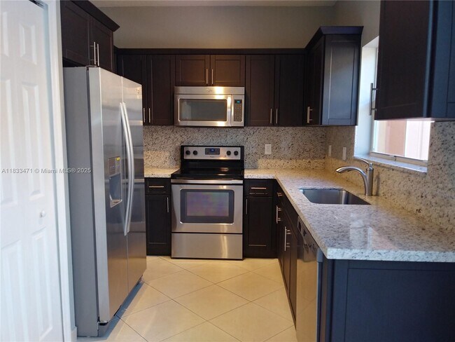 Building Photo - 8425 NW 141st Terrace