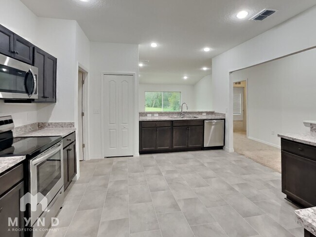 Foto del edificio - 1167 Woodland Oaks Dr