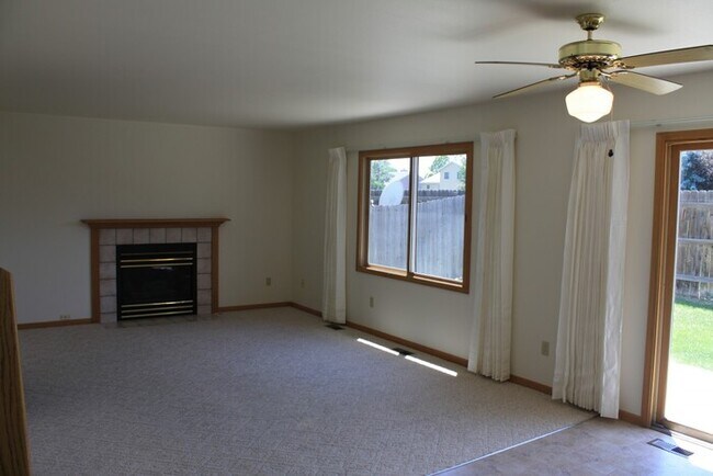 Building Photo - All New Flooring! Huge basement Available ...