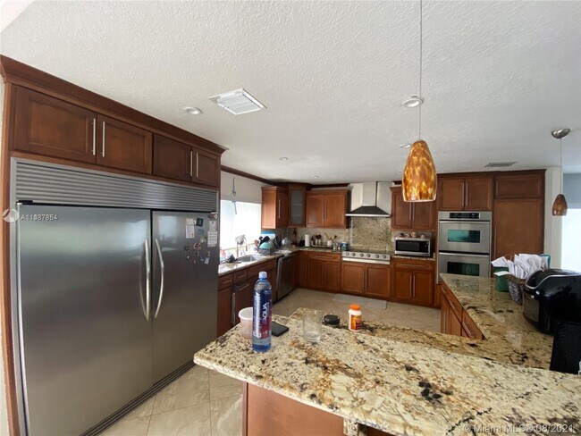 Building Photo - 14458 SW 141st Pl