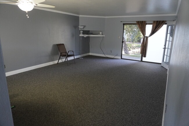 Family room with sliding door to back patio. - 6518 Embarcadero Dr