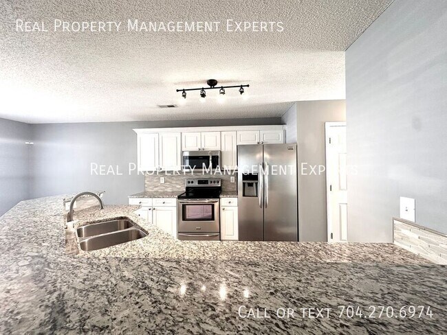 Foto del edificio - 7603 Rolling Meadows Ln