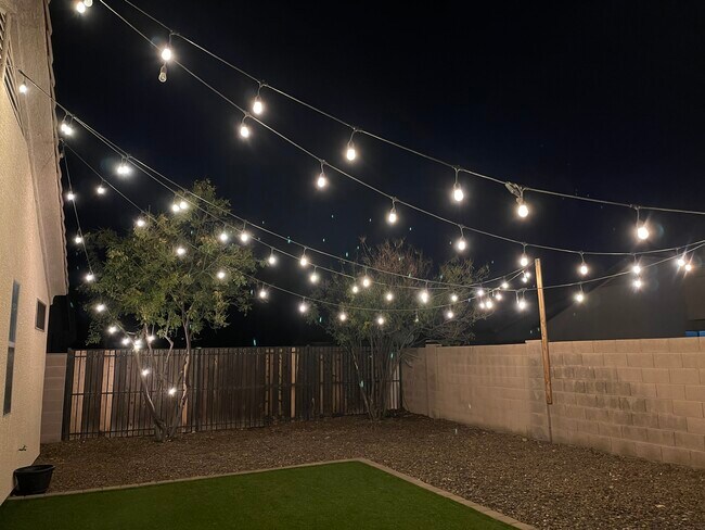 String lights in backyard - 18301 N 90th Ave