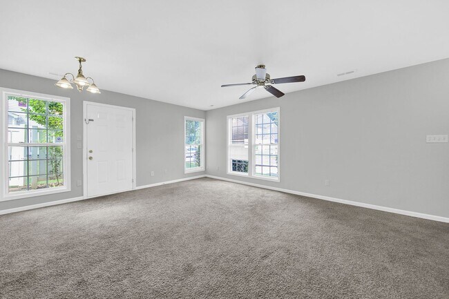 Building Photo - Two-story Condominium with Easy Highway Ac...