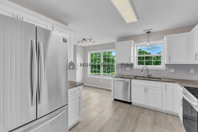 Foto del edificio - 503 Bellmeade Bay Dr